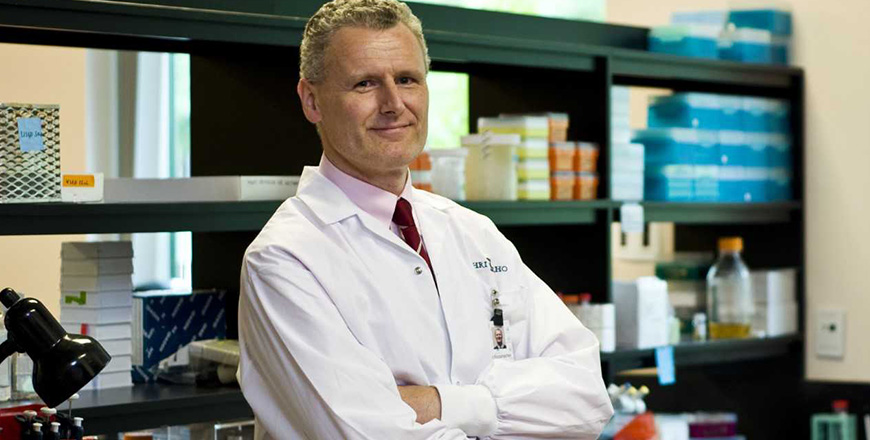 Dr. Michael Schlossmacher in his lab.